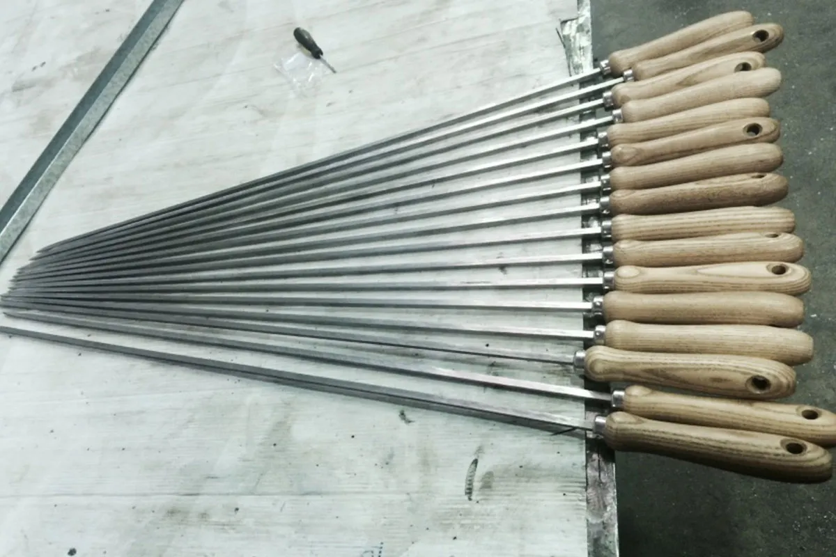 Stainless steel skewers with timber handles